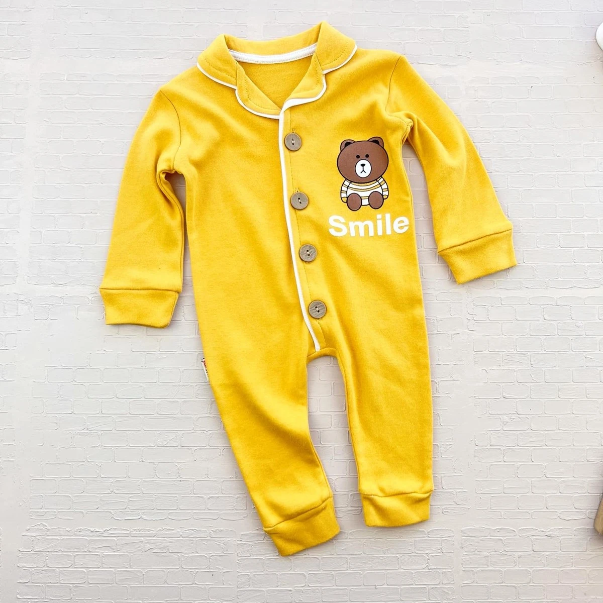 bebek tulum 3-18 ay smile yazı baskılı düğmeli sarı